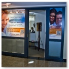 Entrance signs for Dr Nowak's Dental Office in downtown Calgary.